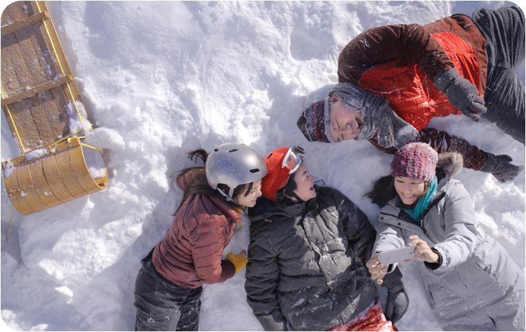 Family in snow together