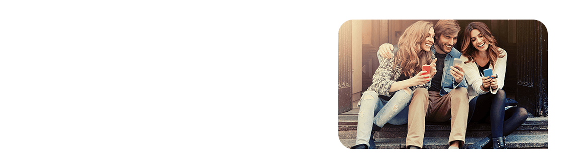 Friends sitting using their phone