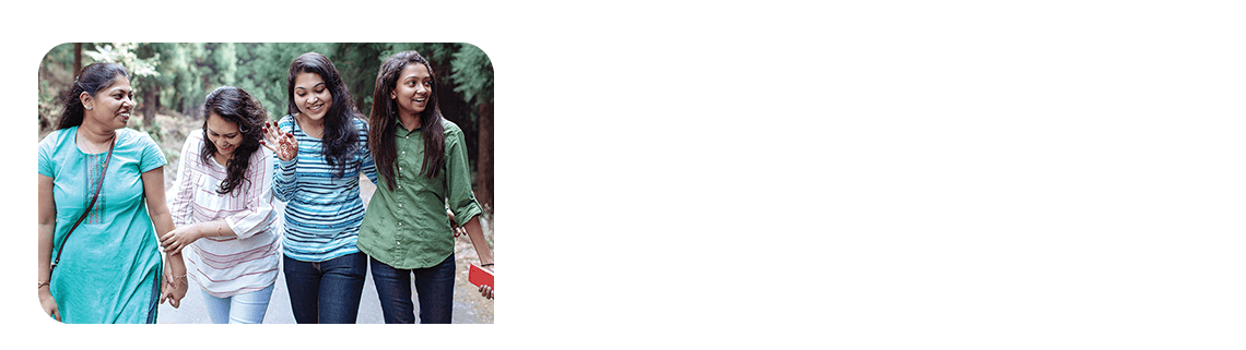 Family walking through a park